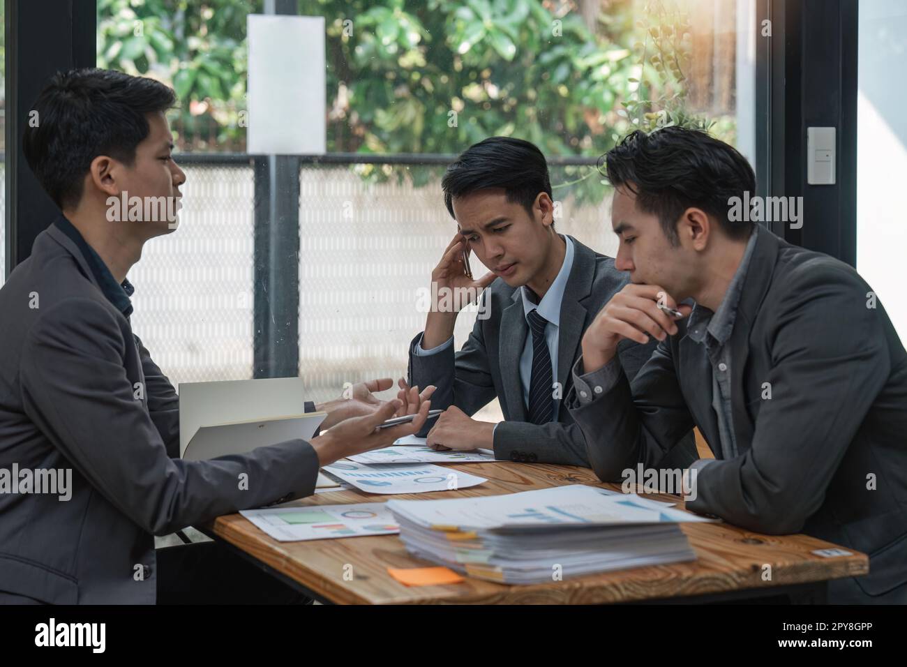 business team sitting stress and solving problem in office Stock Photo
