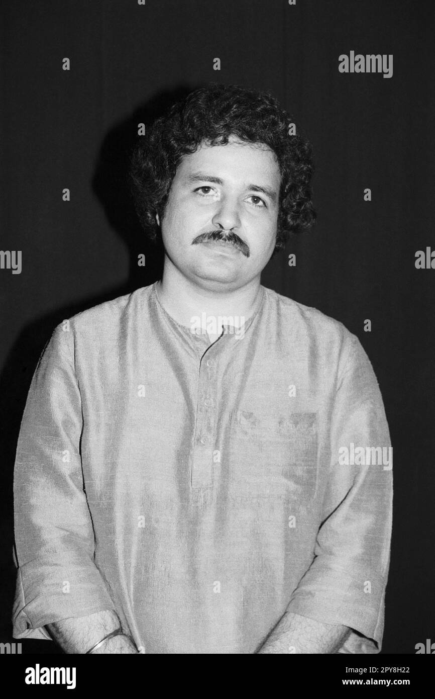 Indian old vintage 1980s black and white bollywood cinema hindi movie film actor, India,  Ashok Khosla, Indian singer, India Stock Photo