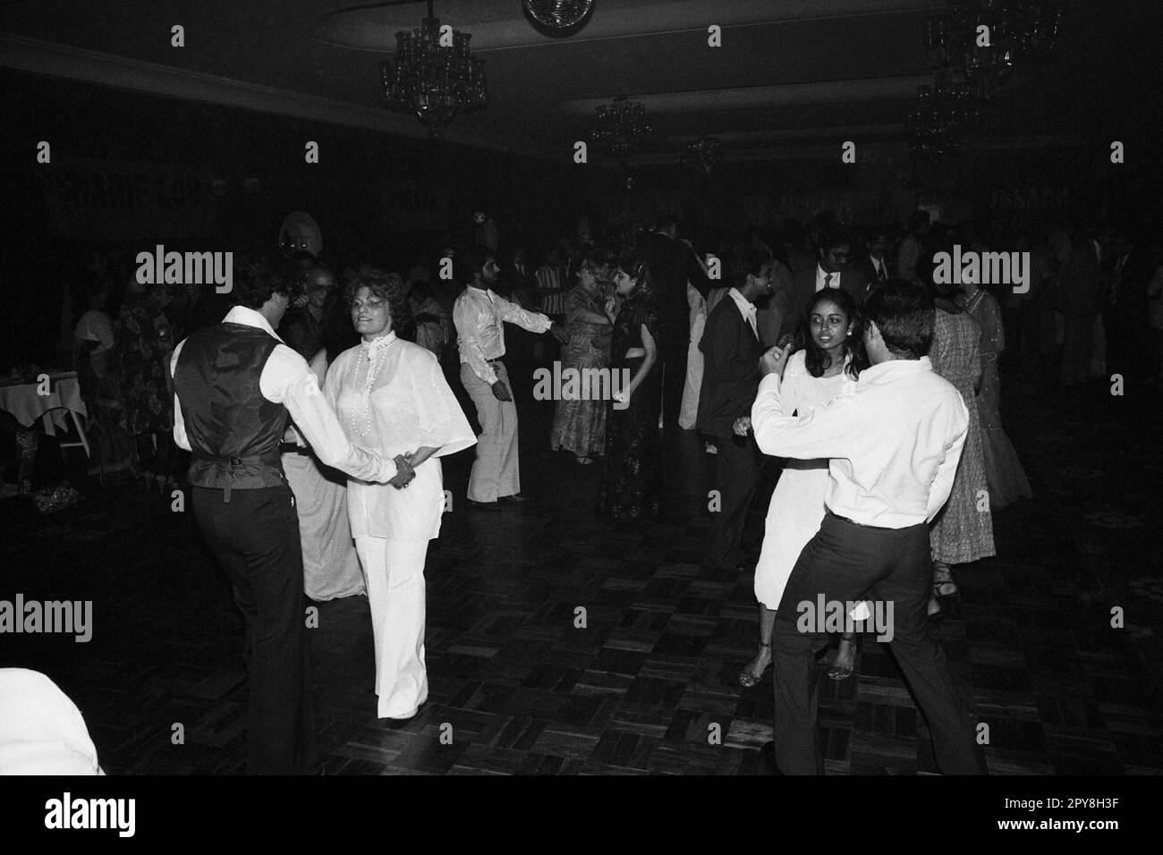 Indian old vintage 1980s black and white bollywood cinema hindi movie film actor, India, Indian bollywood dance party, India Stock Photo