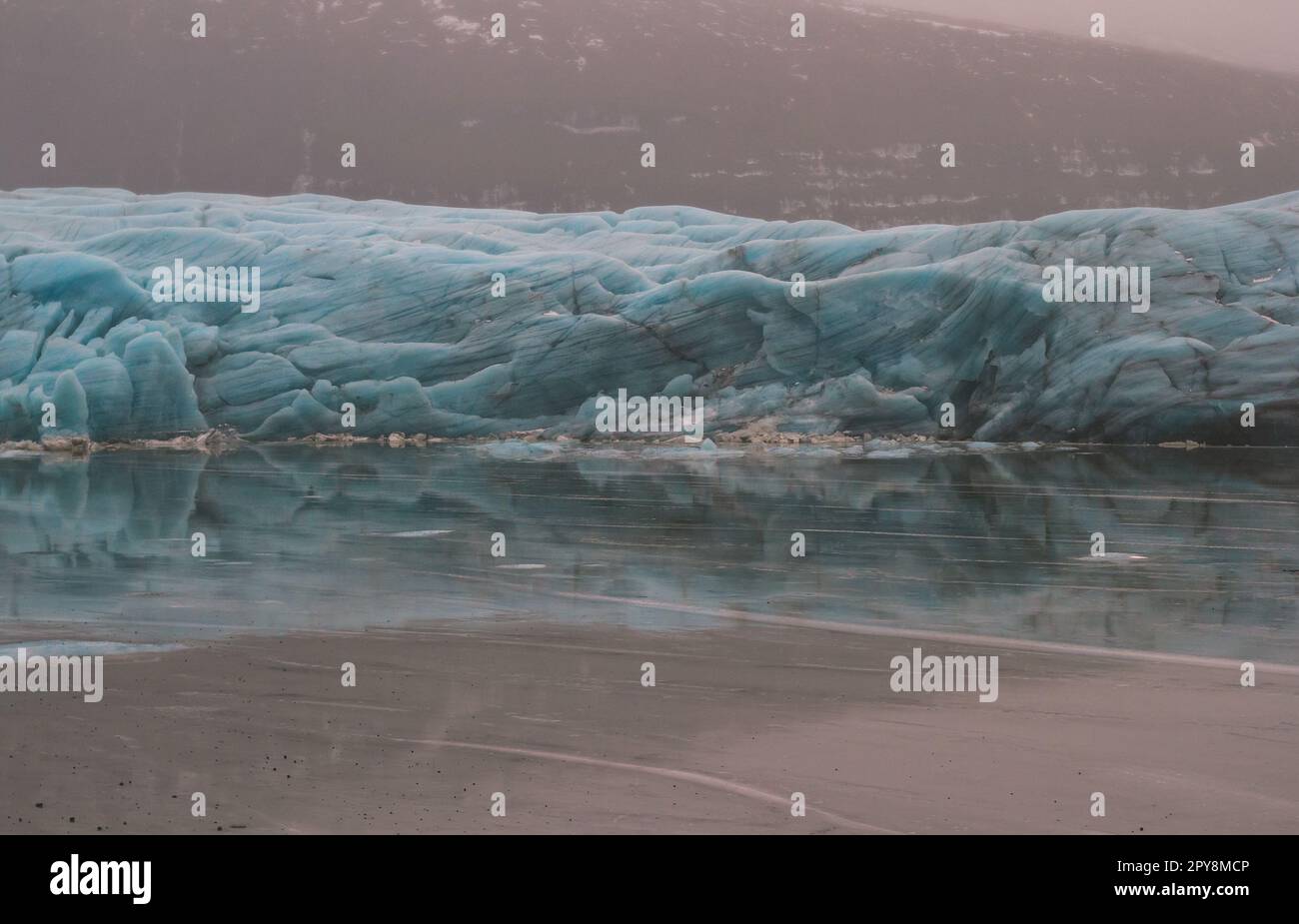 Huge glacier near frozen lake landscape photo Stock Photo