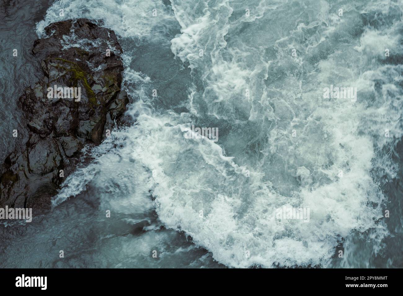 Swirling Hvira river with rock landscape photo Stock Photo