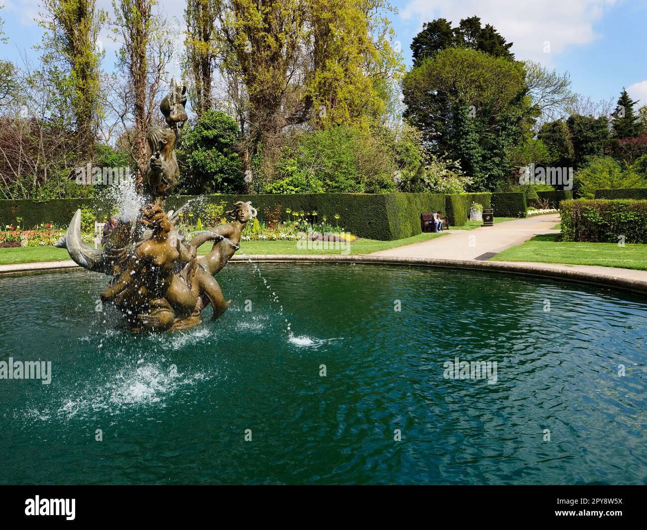 Triton and Dryads Fountain in Queen Marys Garden in Spring at Regents Park London England Stock Photo