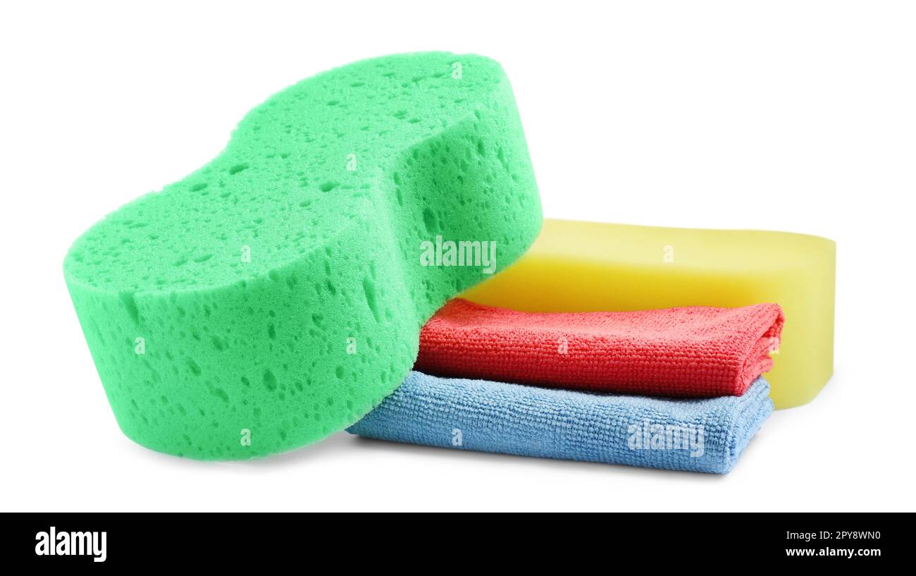 Sponges and car wash cloths on white background Stock Photo Alamy