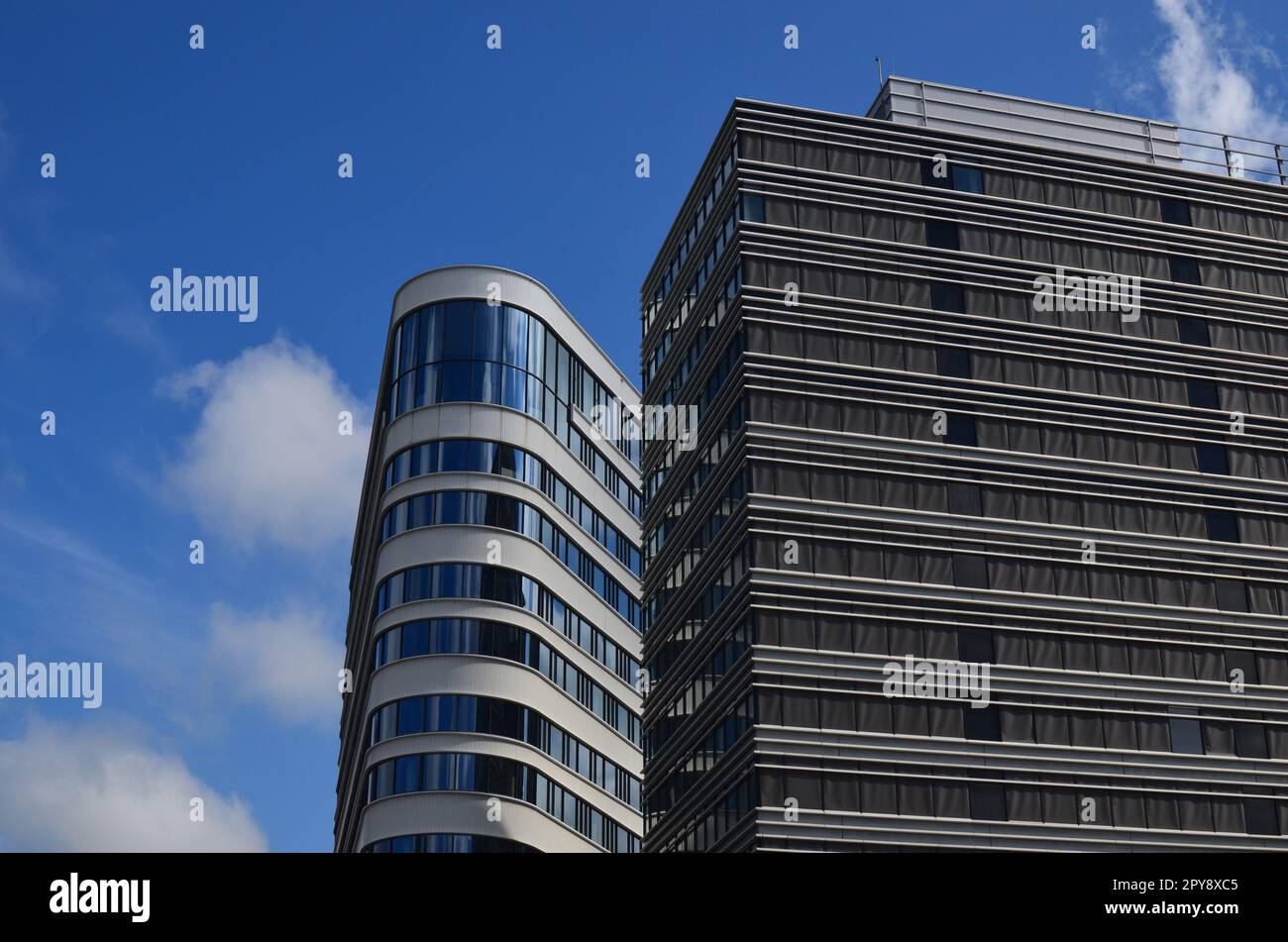 Exterior of beautiful buildings against blue sky Stock Photo - Alamy