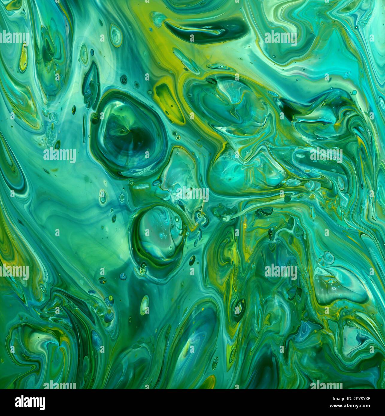 Teal green and yellow abstract fluid art background of acrylic paint