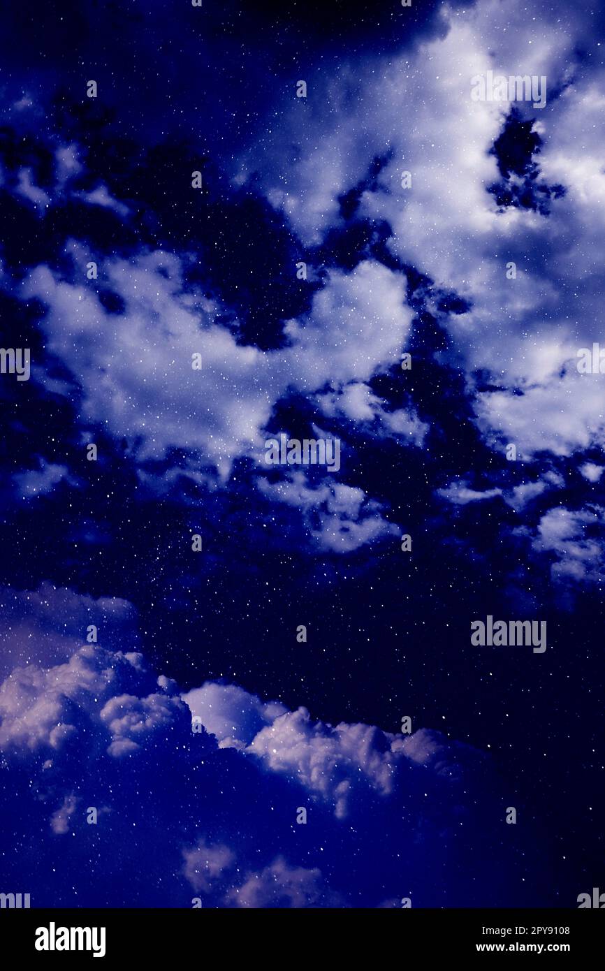 Beautiful view of night sky with clouds and stars Stock Photo - Alamy