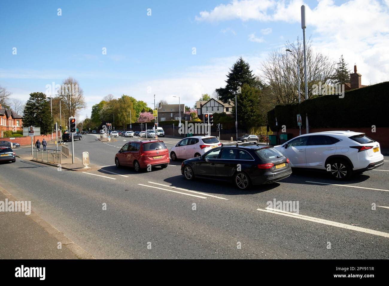 busy traffic junction on the malone road with balmoral avenue and newforge lane south belfast northern ireland uk Stock Photo