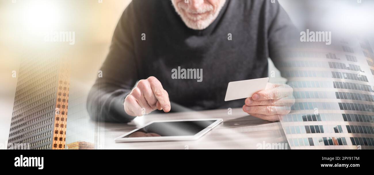 Man using his credit card for online payment; multiple exposure Stock ...