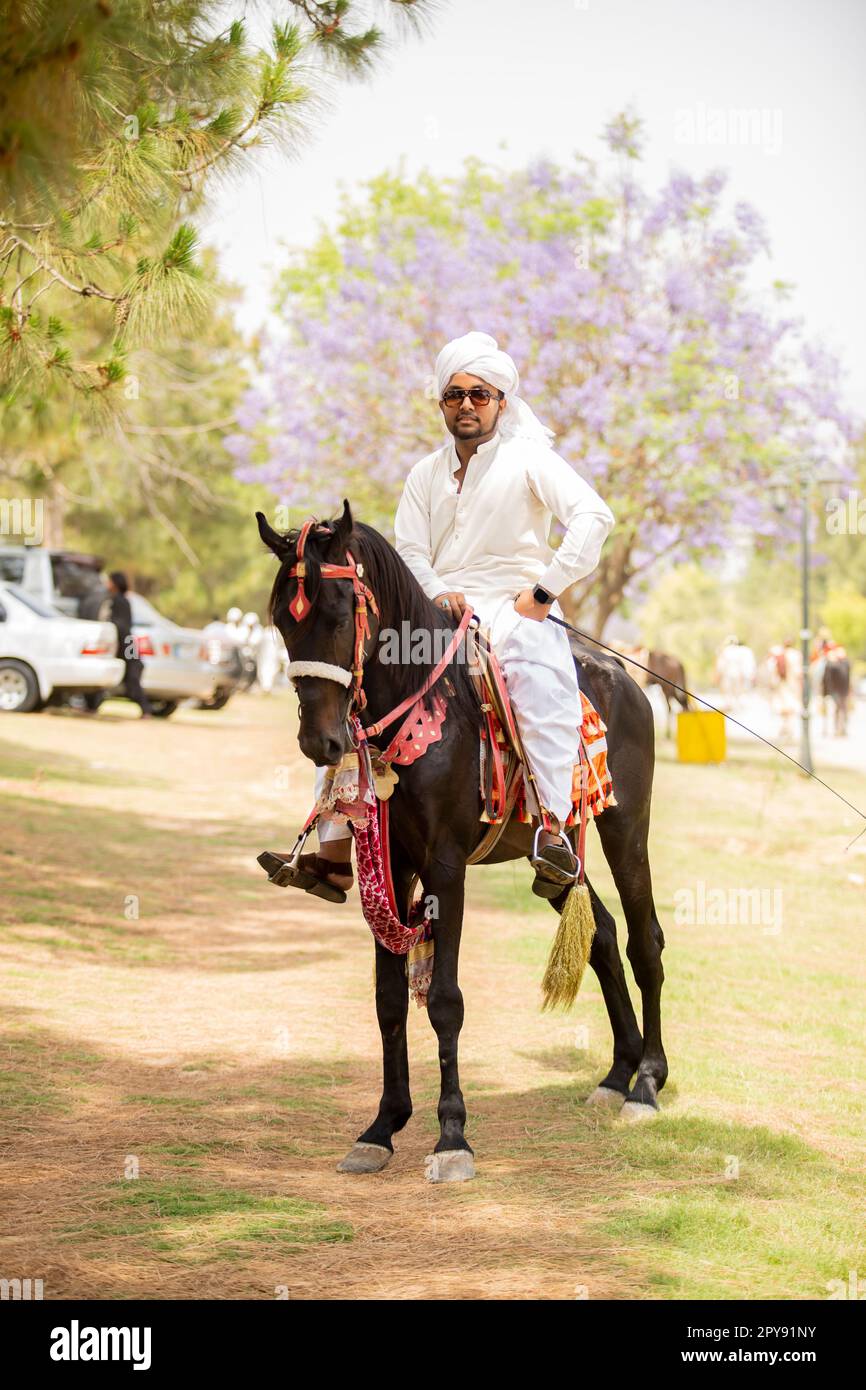 Pakistan, Asian Horse rider on traditional Islamabad Championship tent pegging festival in Islamabad tent pegging . 30-April-2023 Stock Photo