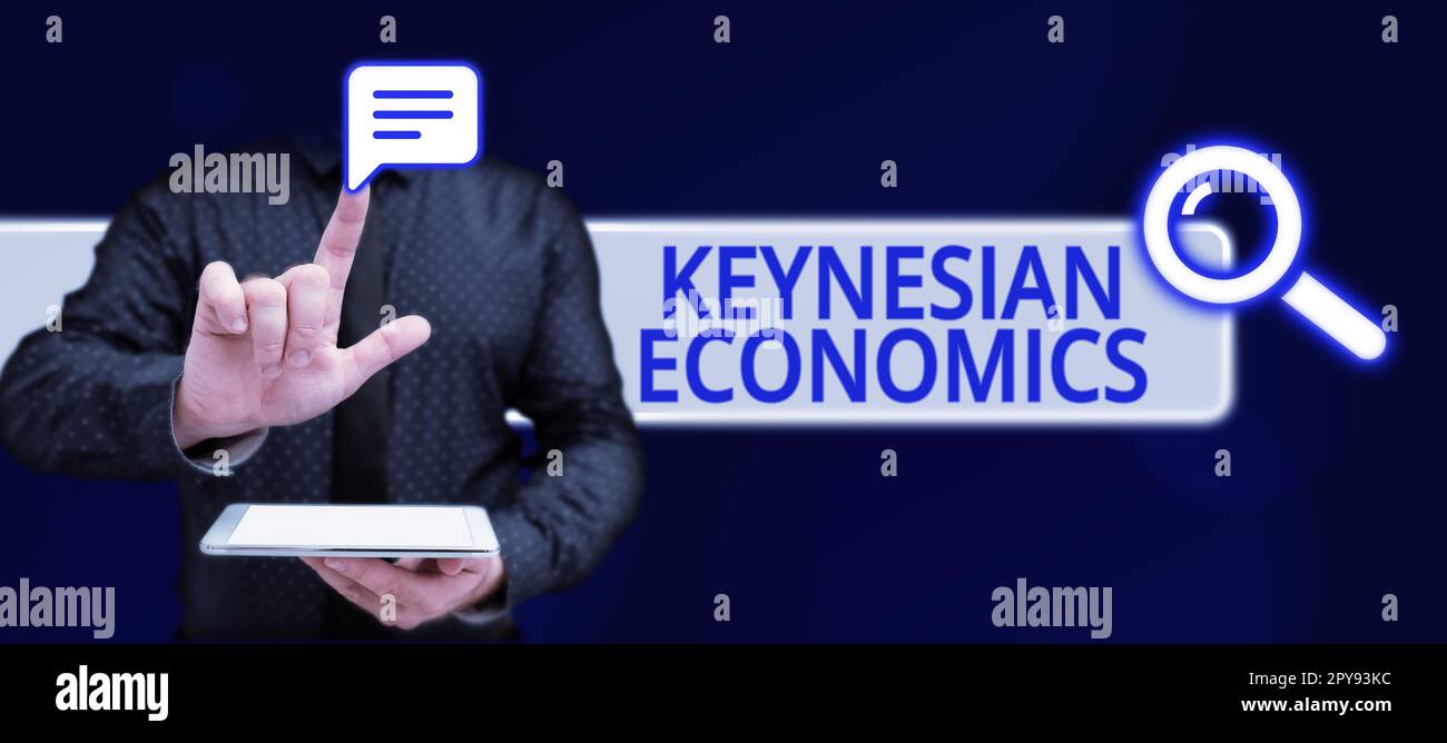 Hand writing sign Keynesian Economics. Concept meaning monetary and fiscal programs by government to increase employment Stock Photo