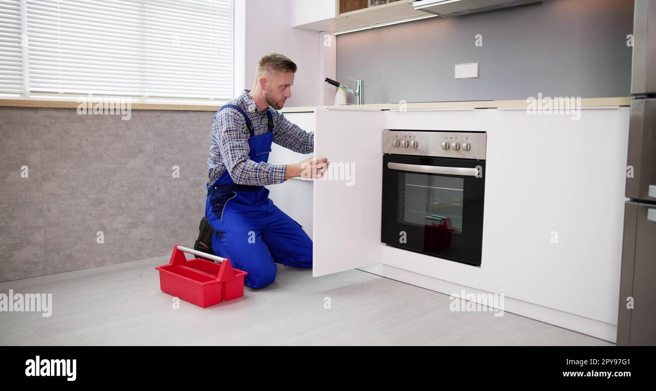 Home Kitchen Repair And Maintenance Stock Photo Alamy