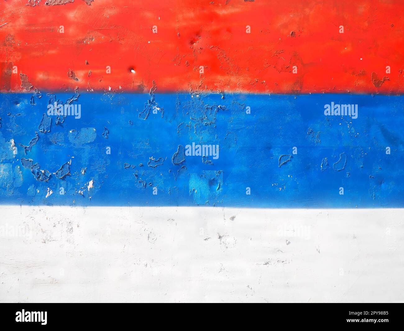 Serbian flag, tricolor red, blue, white painted on a metal surface
