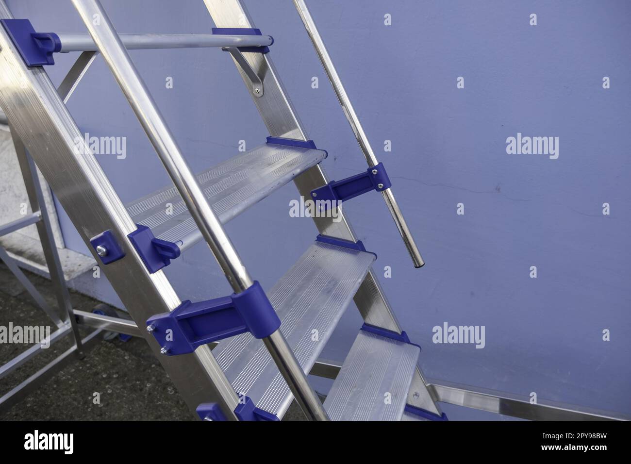 Aluminum ladder for work Stock Photo