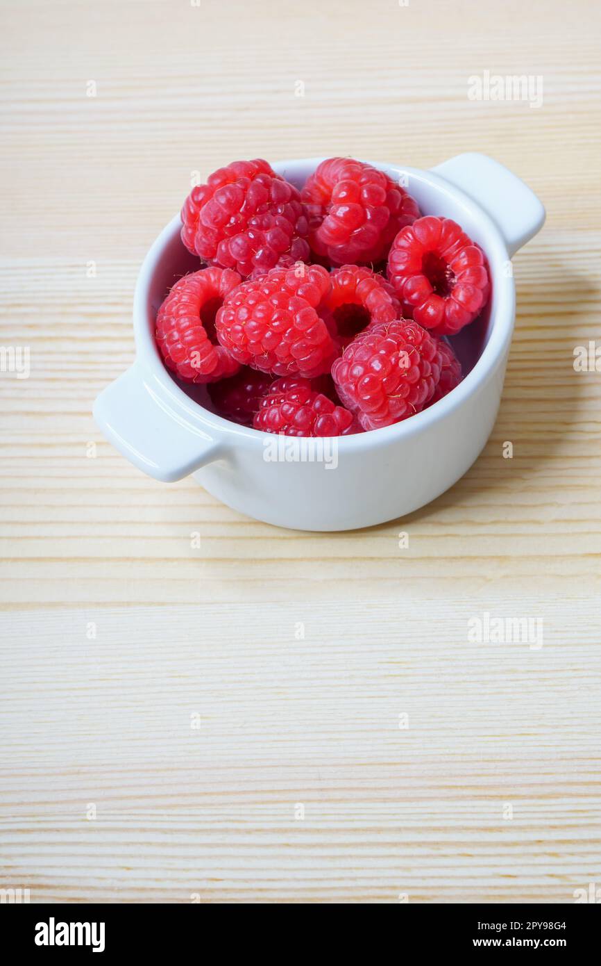 Fresh red raspberries, still life, closeup and detail view Stock Photo