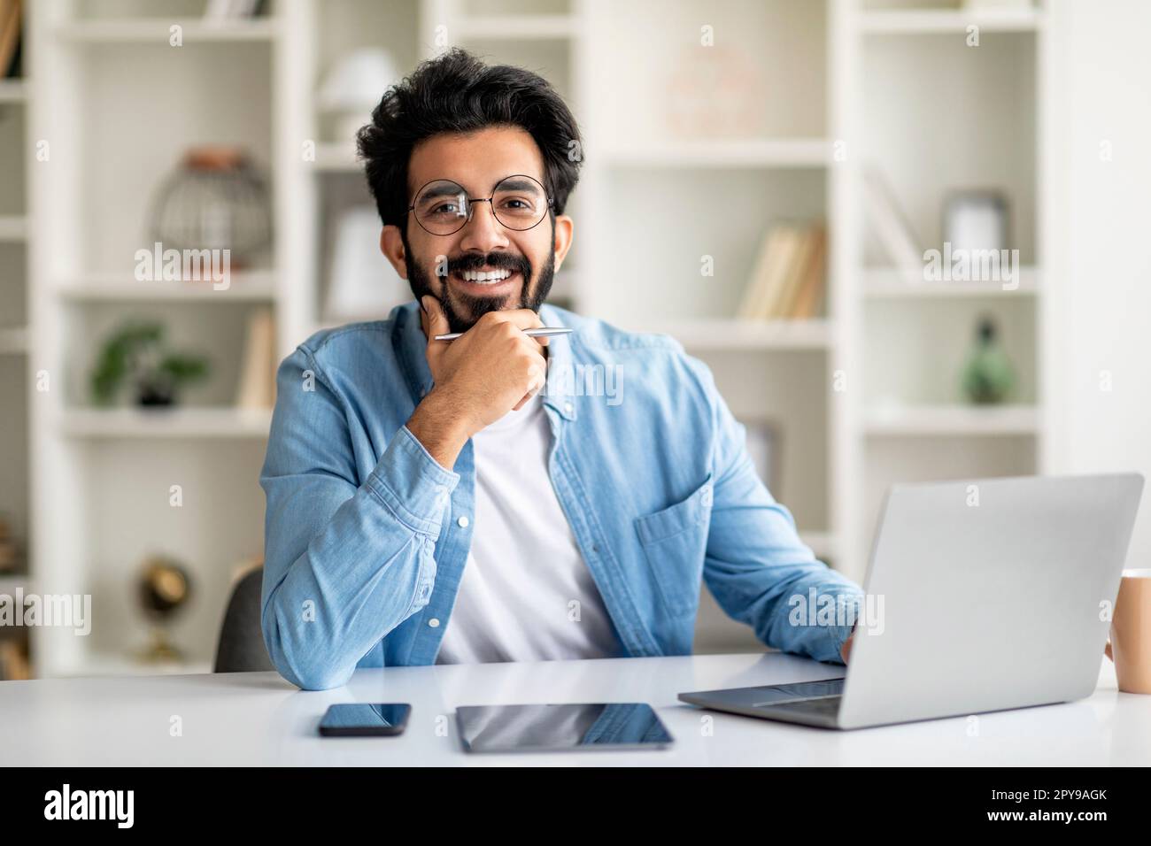 Happy successful indian man hi-res stock photography and images - Alamy