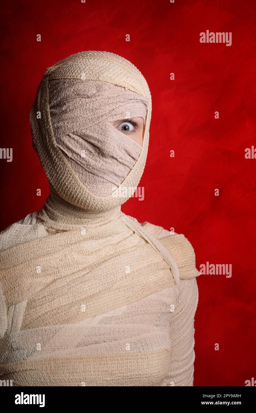 wide-eyed female mummy covered in bandages Stock Photo - Alamy