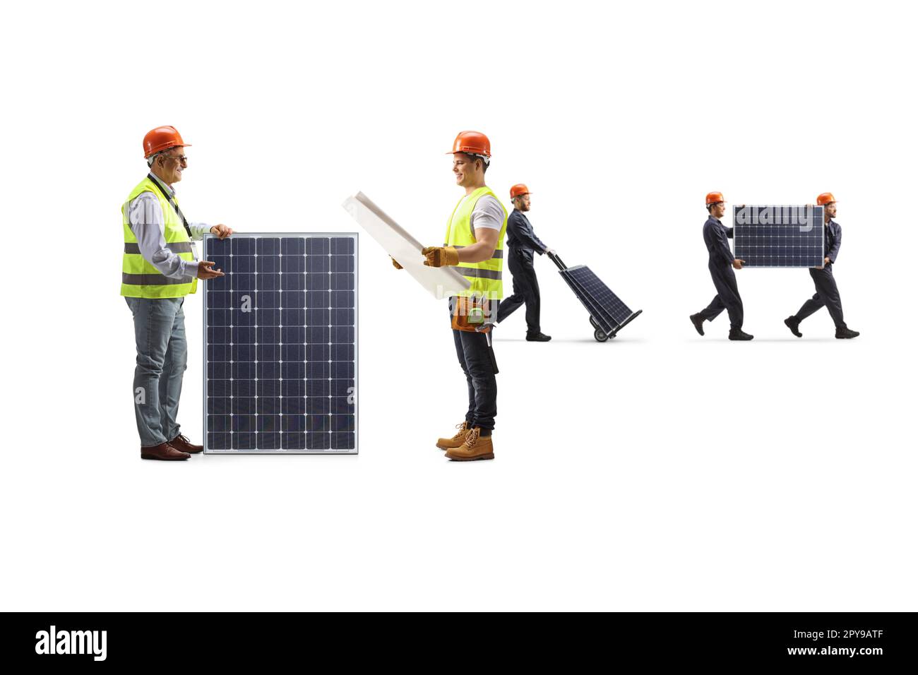 Engineers looking at a plan and workers carrying photovoltaic panels isolated on white background Stock Photo