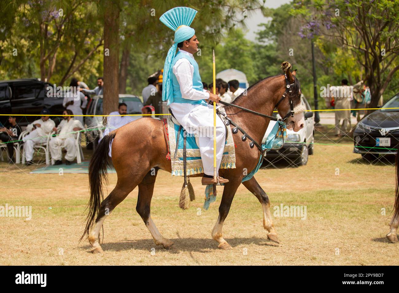 Pakistan, Asian Horse rider on traditional Islamabad Championship tent ...