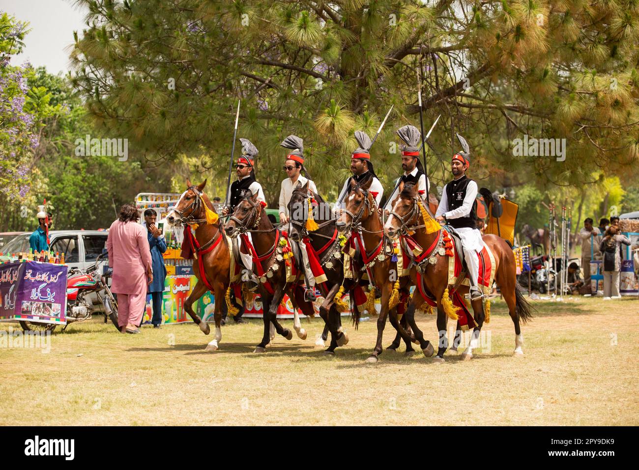 Pakistan, Asian Horse rider on traditional Islamabad Championship tent ...