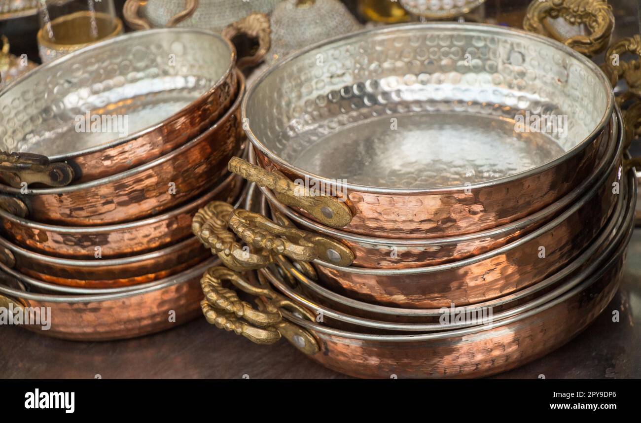 Set of new metal pans as cookware Stock Photo - Alamy