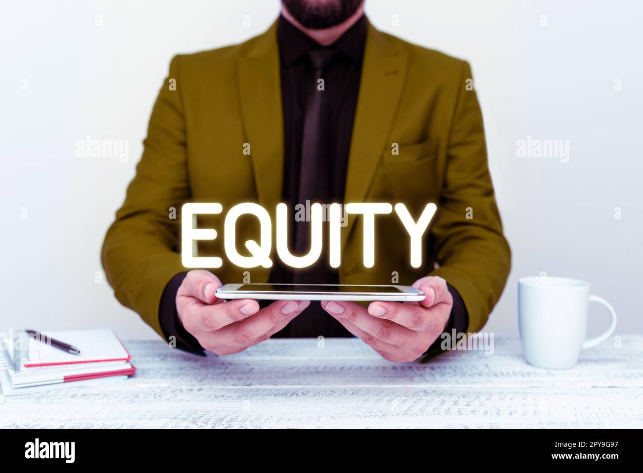 Hand writing sign Equity. Internet Concept quality of being fair and impartial race free One hand Unity Stock Photo