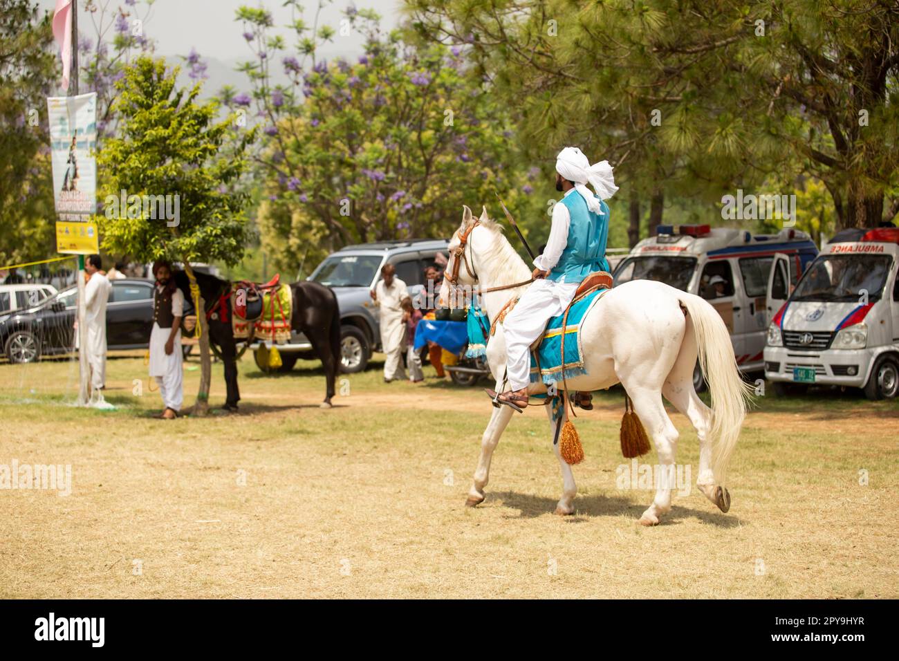 Pakistan, Asian Horse rider on traditional Islamabad Championship tent ...
