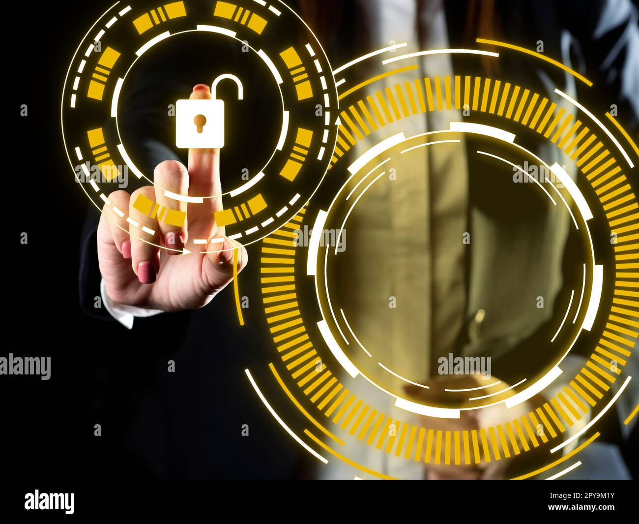 Businesswoman in office suit standing and pressing virtual button with her finger. Futuristic style image with colored glow. New digital technologies. Stock Photo