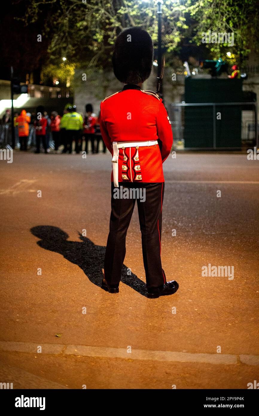 Guard on the Mall during night time Military Rehearsal for the Coronation of King Charles III, London, UK, 3rd May 2023 Stock Photo