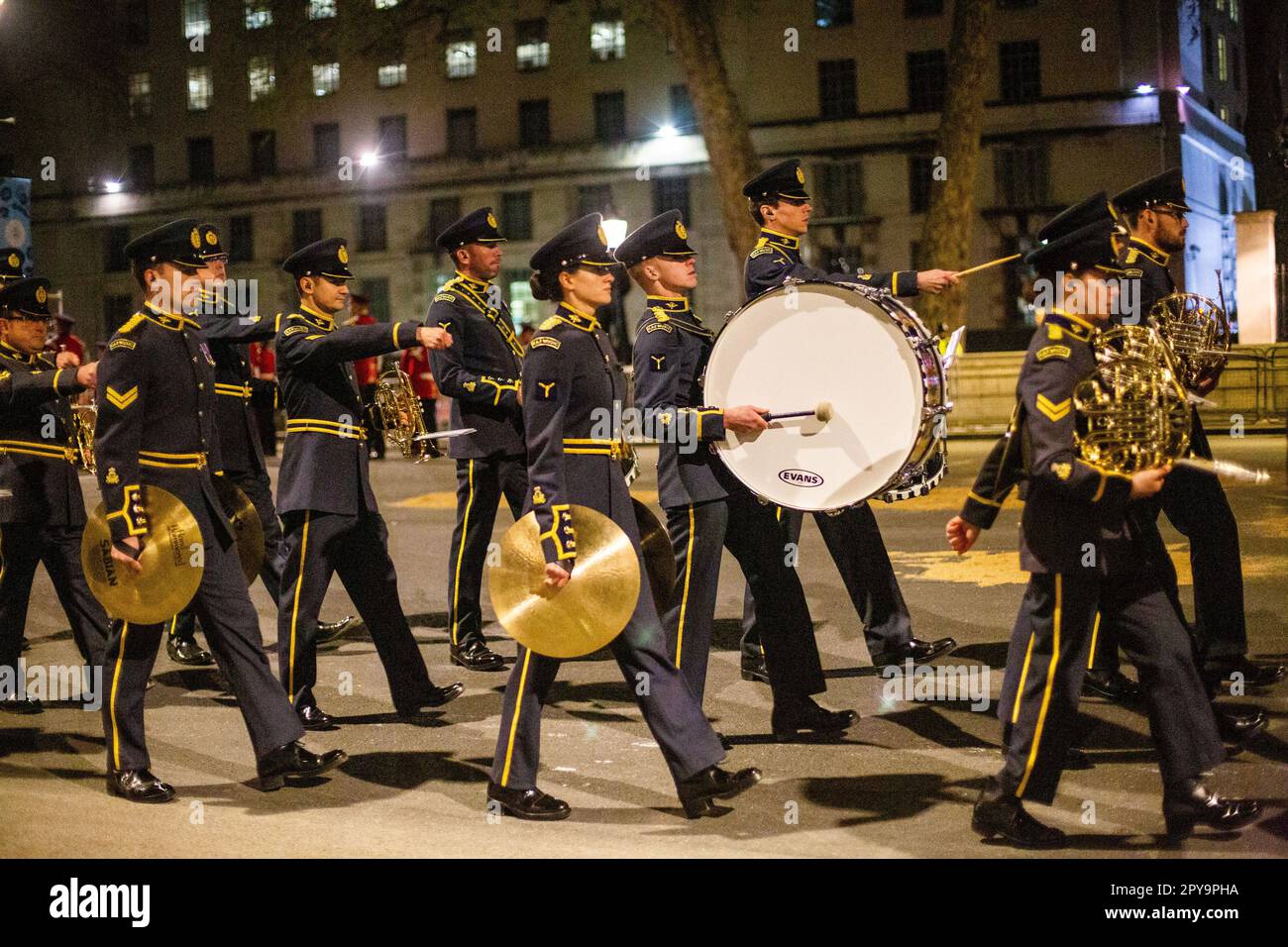 RAF Music Band Marching during Night time Military Rehearsal for the Coronation of King Charles III Stock Photo