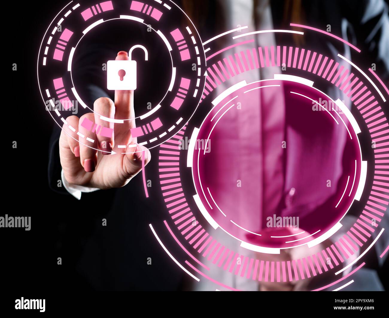 Businesswoman in office suit standing and pressing virtual button with her finger. Futuristic style image with colored glow. New digital technologies. Stock Photo