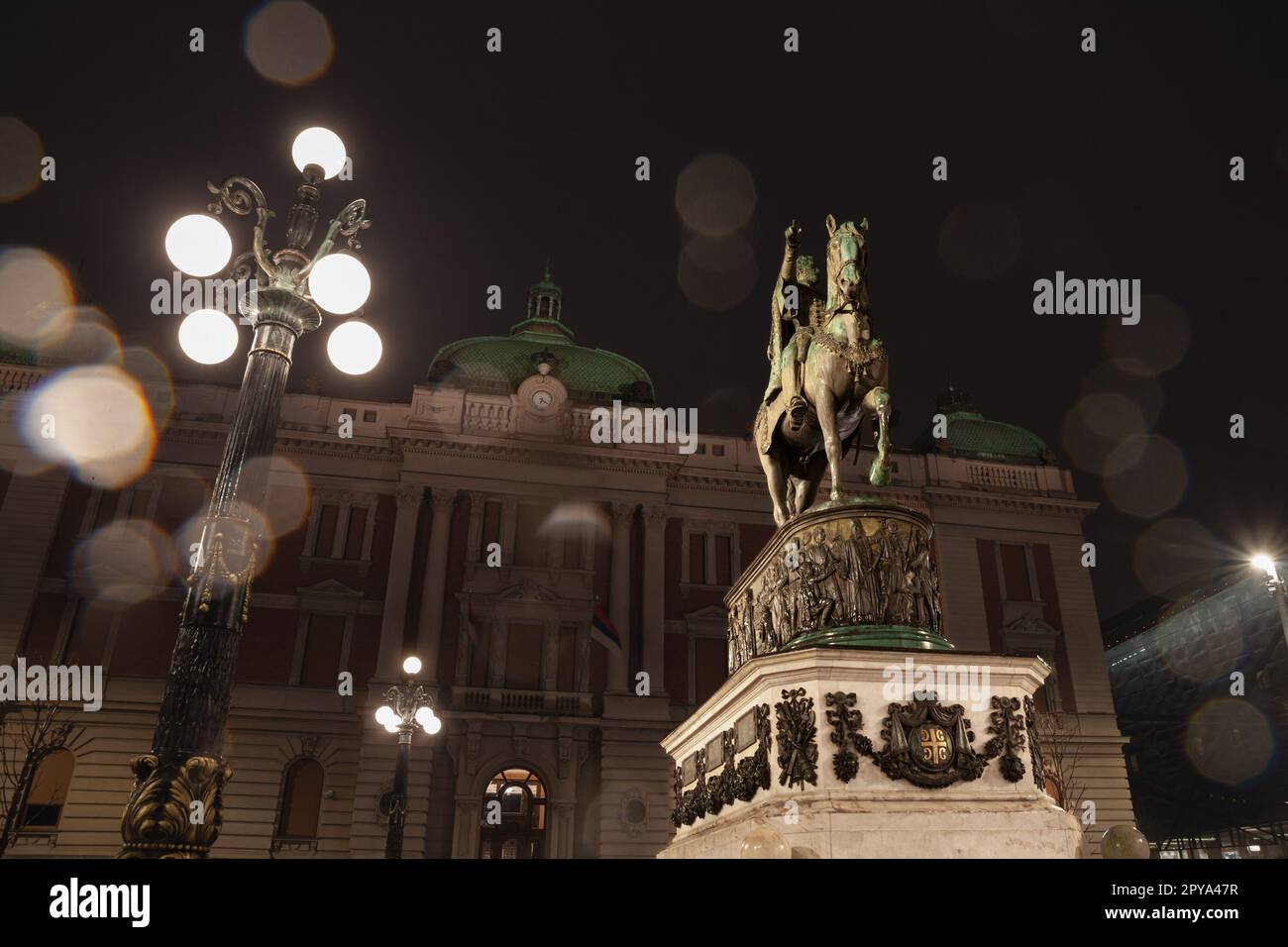 Picture of the national museum of Serbia in belgrade with the statue of Prince Mihailo in front, on Trg Republike, also called republic square at nigh Stock Photo