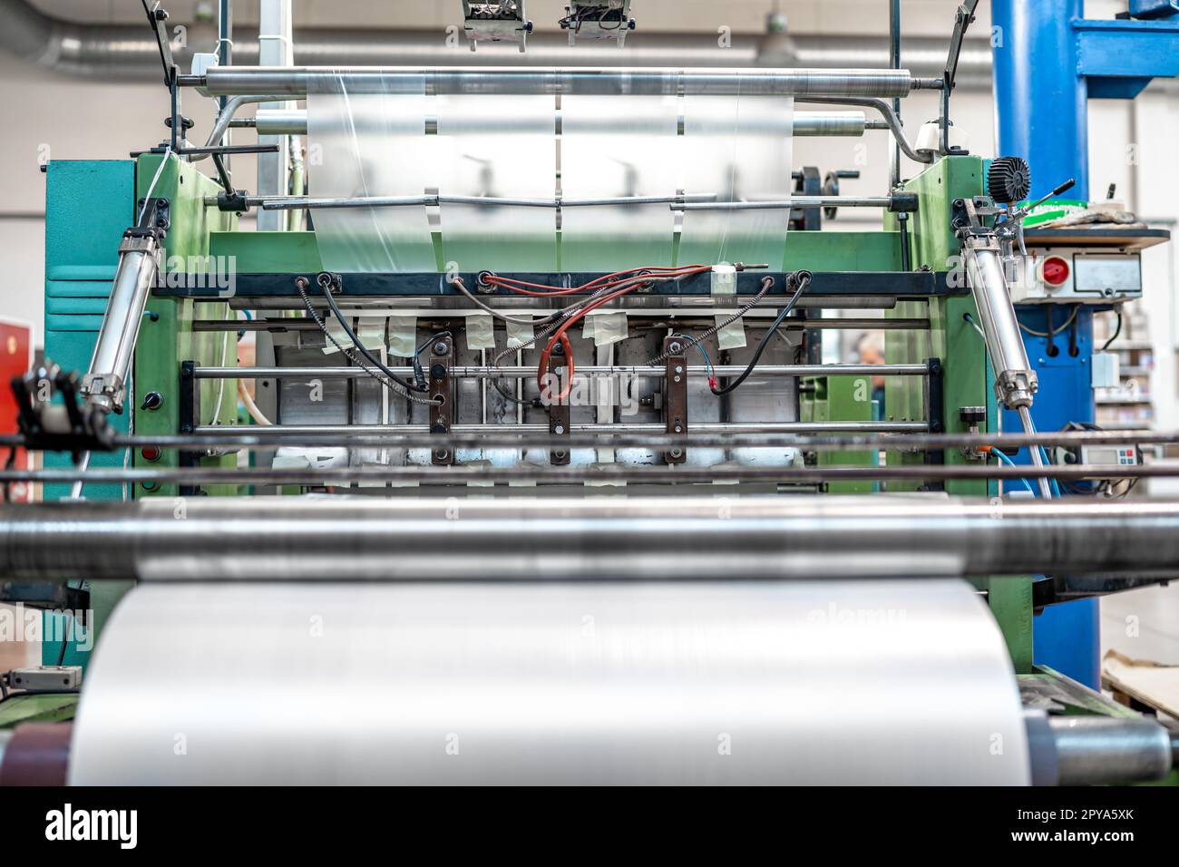 production of plastic packaging in a factory on an automated line Stock Photo