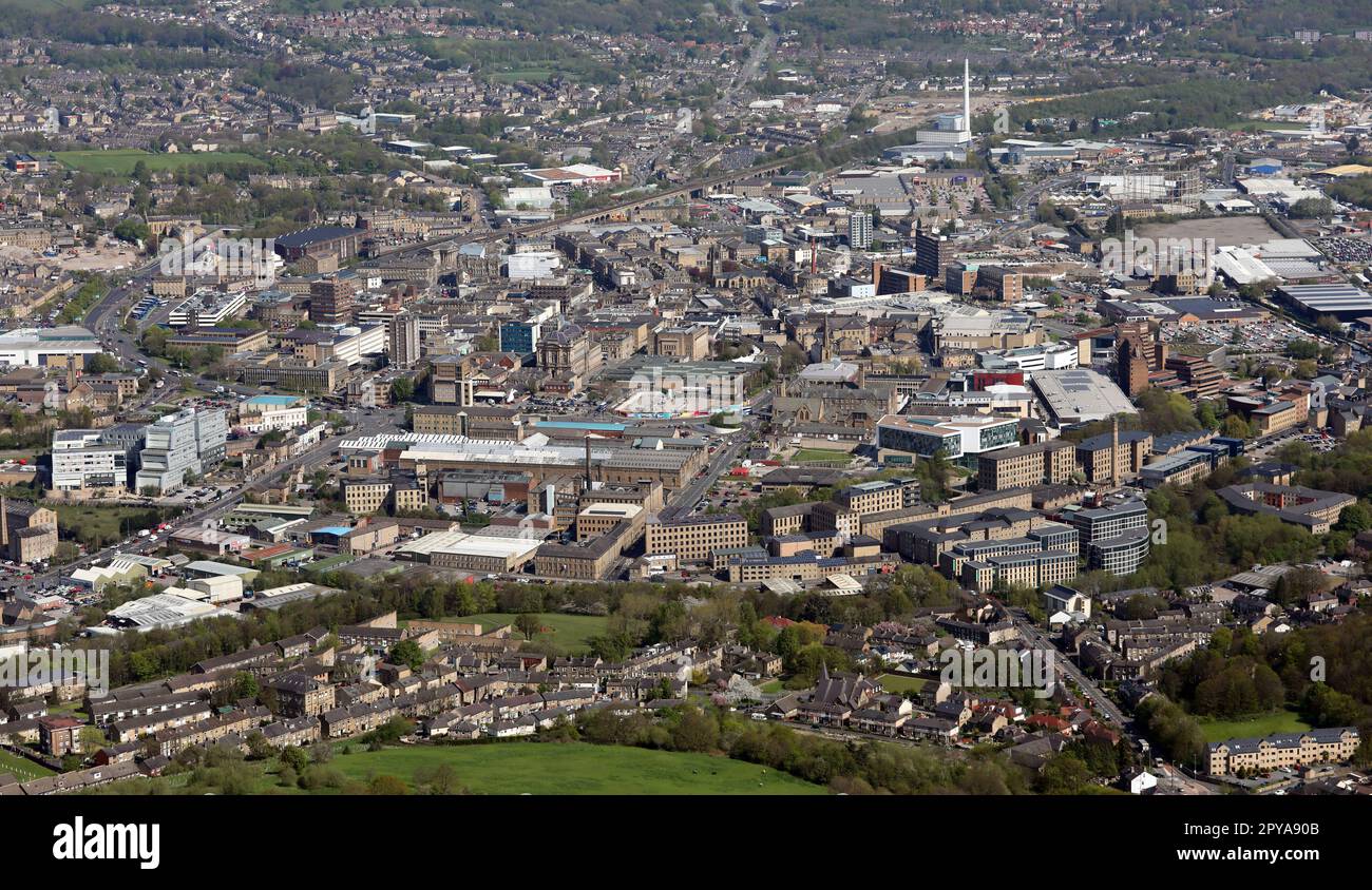 aerial view of Huddersfield town centre from the South and including Huddersfield University in the foreground, West Yorkshire Stock Photo