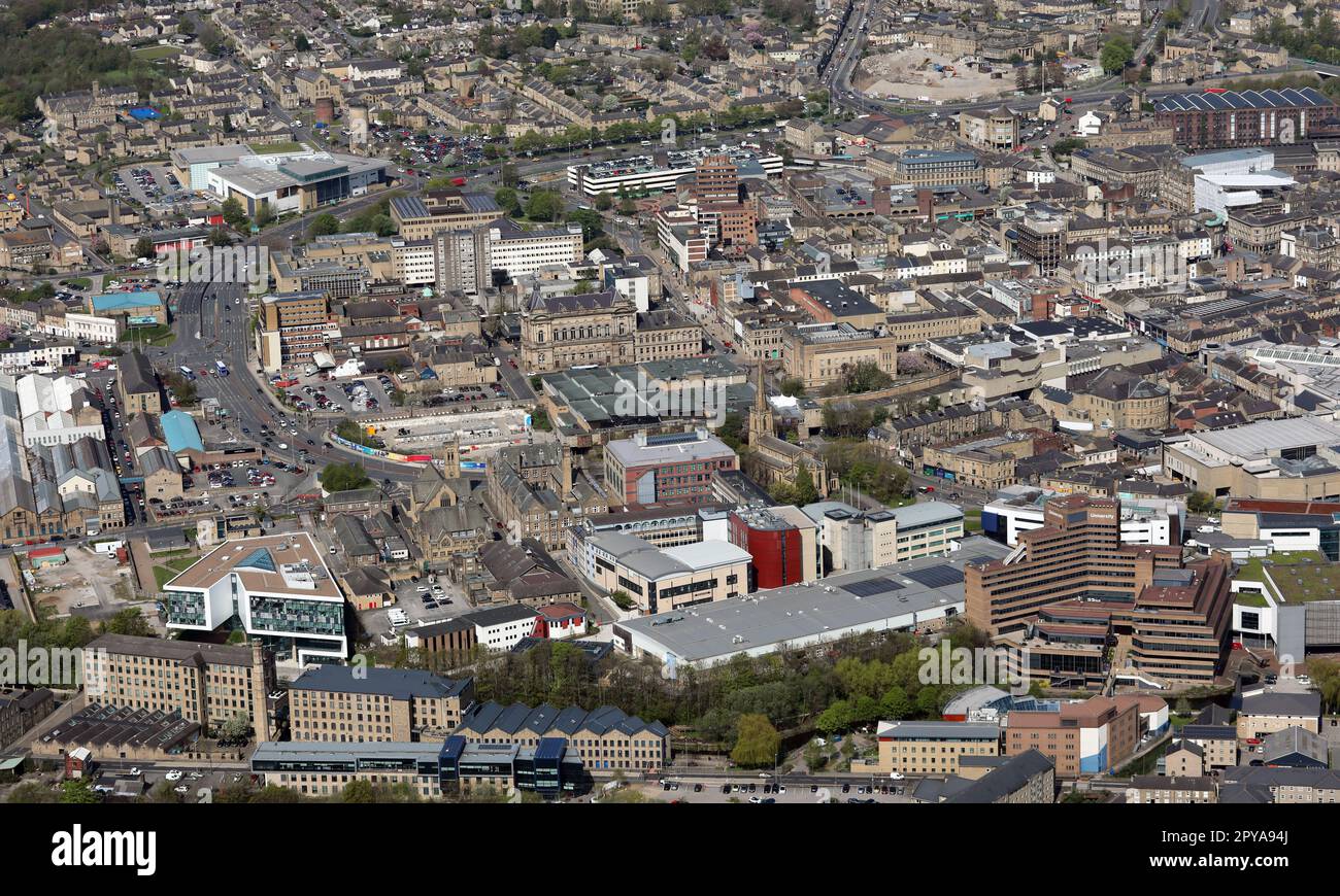 aerial view of Huddersfield town centre from the South and including Huddersfield University in the foreground, West Yorkshire Stock Photo