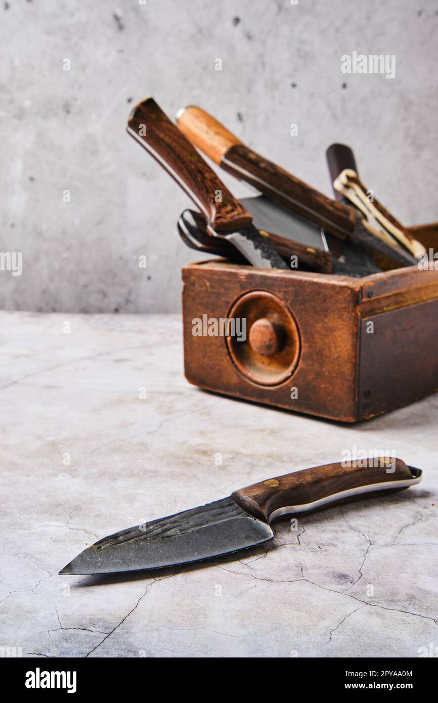 Wooden box with different types of knives Stock Photo Alamy
