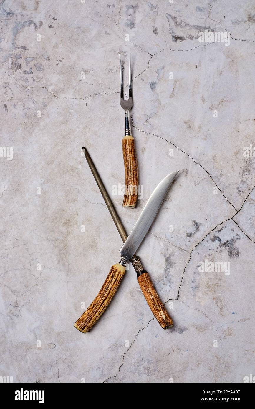 Top view at knife, fork and sharpener Stock Photo - Alamy