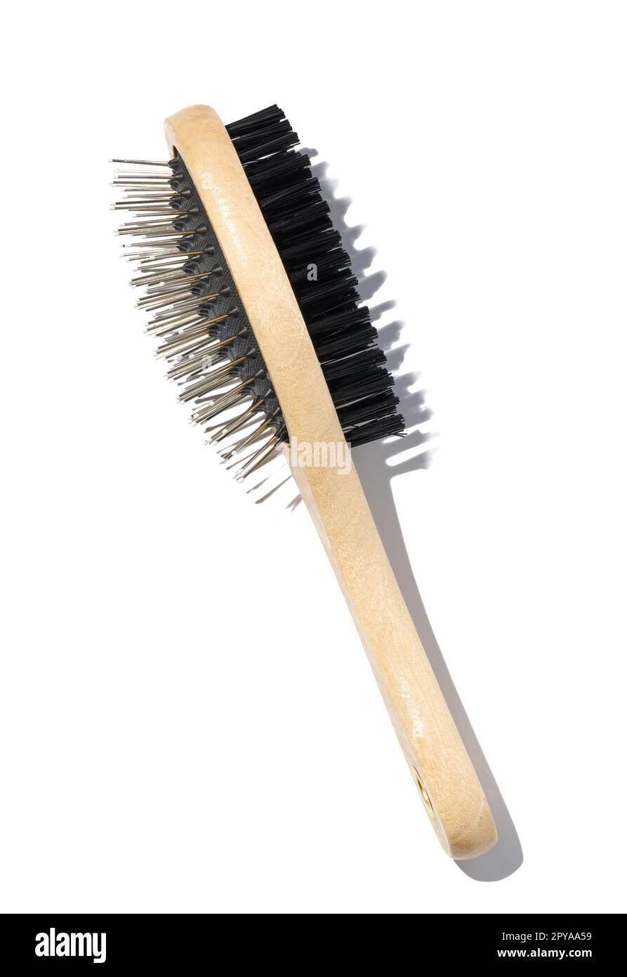 Wooden brush for animals on a white isolated background Stock Photo Alamy