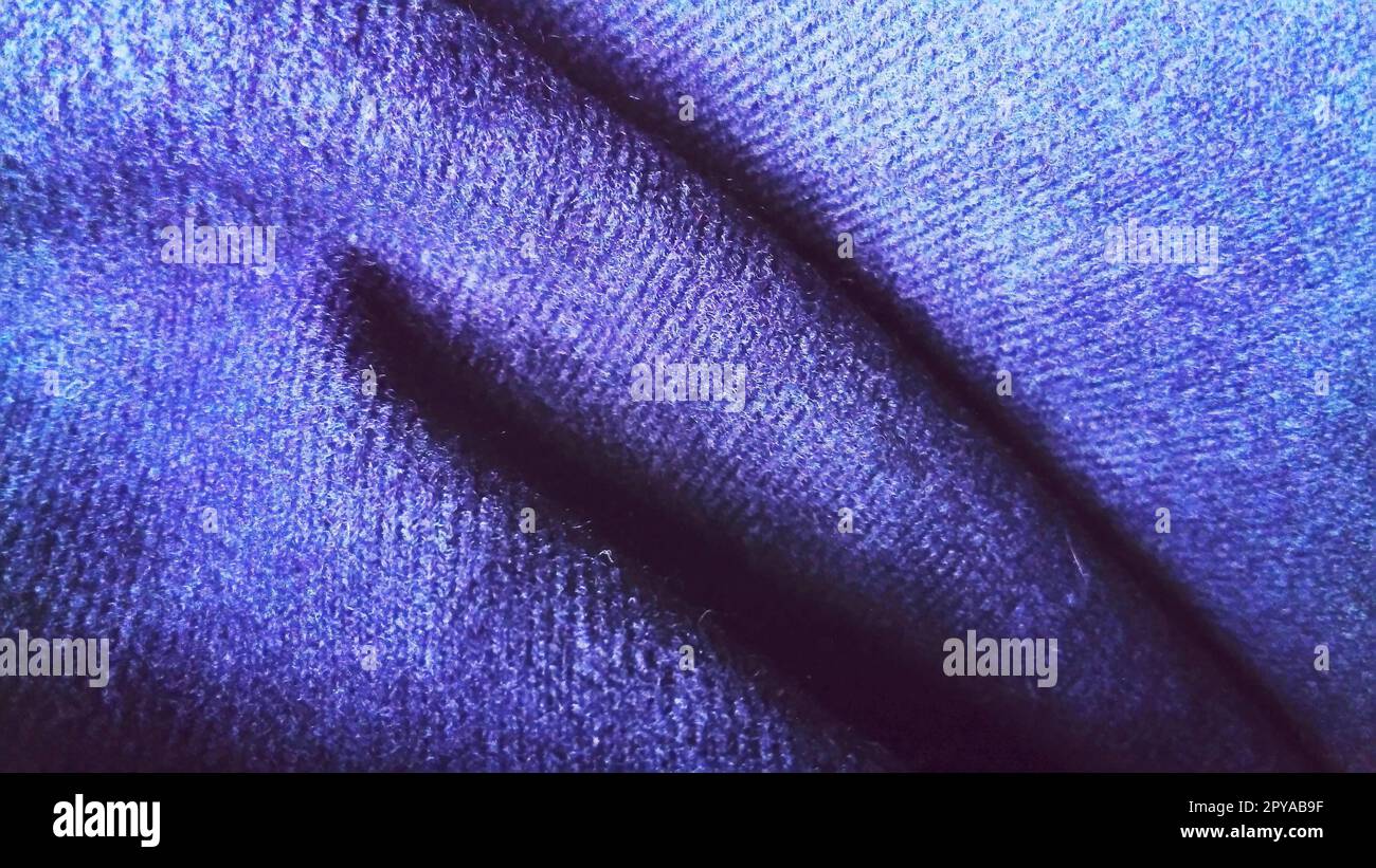 Dark blue fabric that looks like velvet or velveteen. Broken waves for interiors Stock Photo