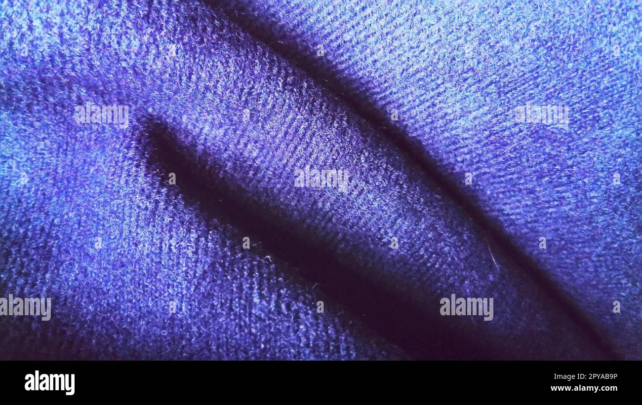 Dark blue fabric that looks like velvet or velveteen. Broken blue waves Stock Photo