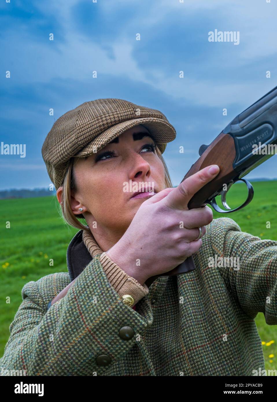 Young woman clay pigeon shooting hi-res stock photography and images - Alamy