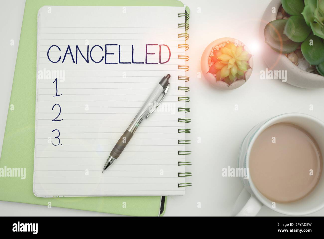 Sign displaying Cancelled. Word for decide or announce that planned event will not take place Stock Photo