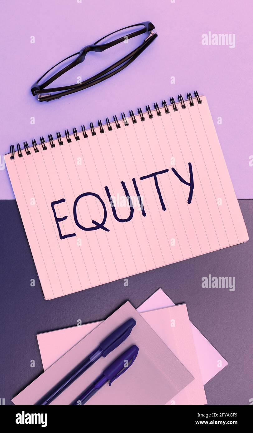 Hand writing sign Equity. Internet Concept quality of being fair and impartial race free One hand Unity Stock Photo