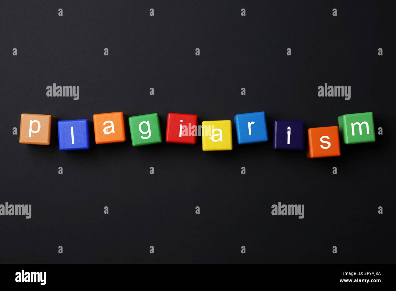 Colorful cubes with word Plagiarism on black background, flat lay Stock ...