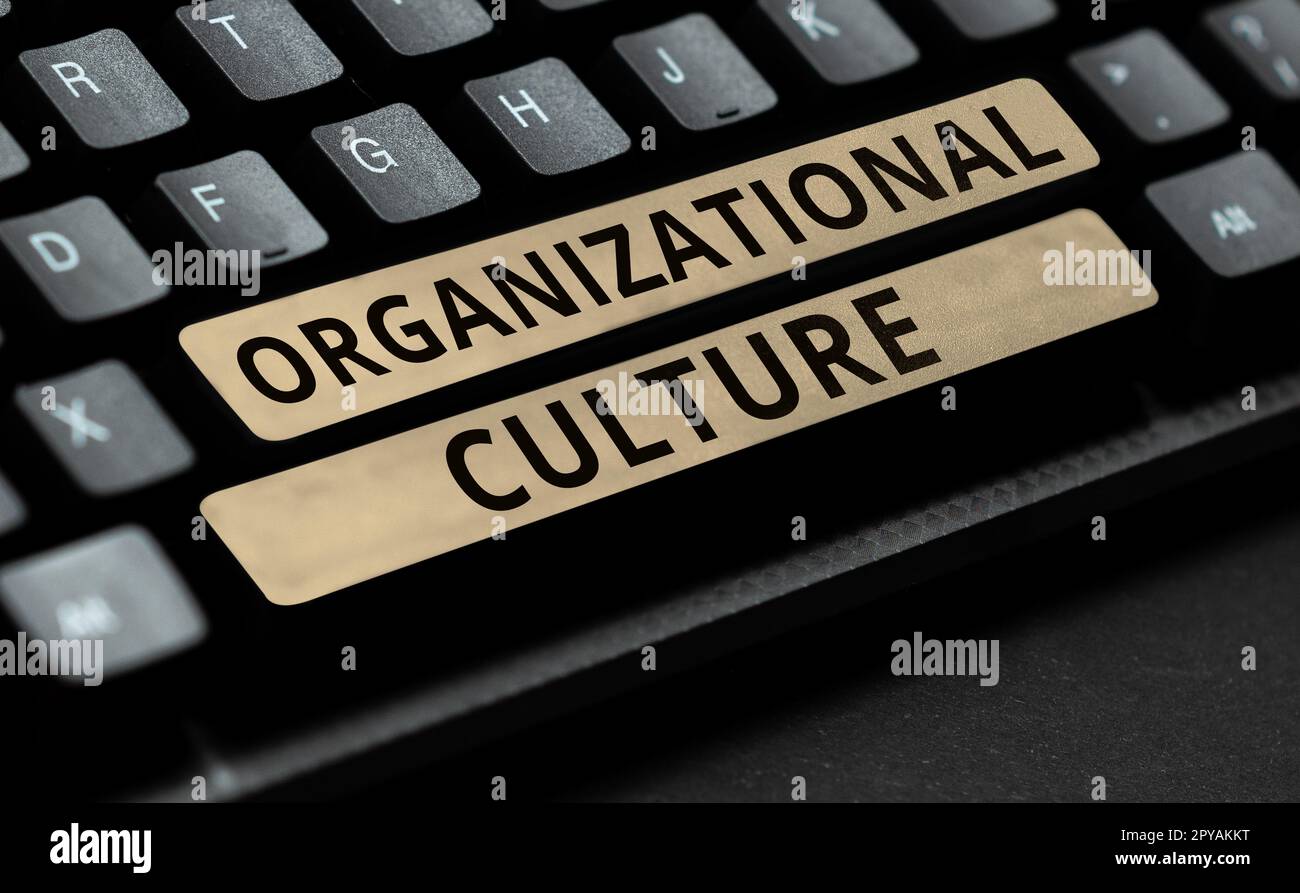 Hand writing sign Organizational Culture. Word for the study of the way people interact within groups Stock Photo