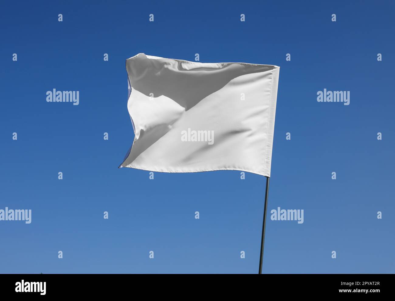 White flag fluttering hi-res stock photography and images - Alamy