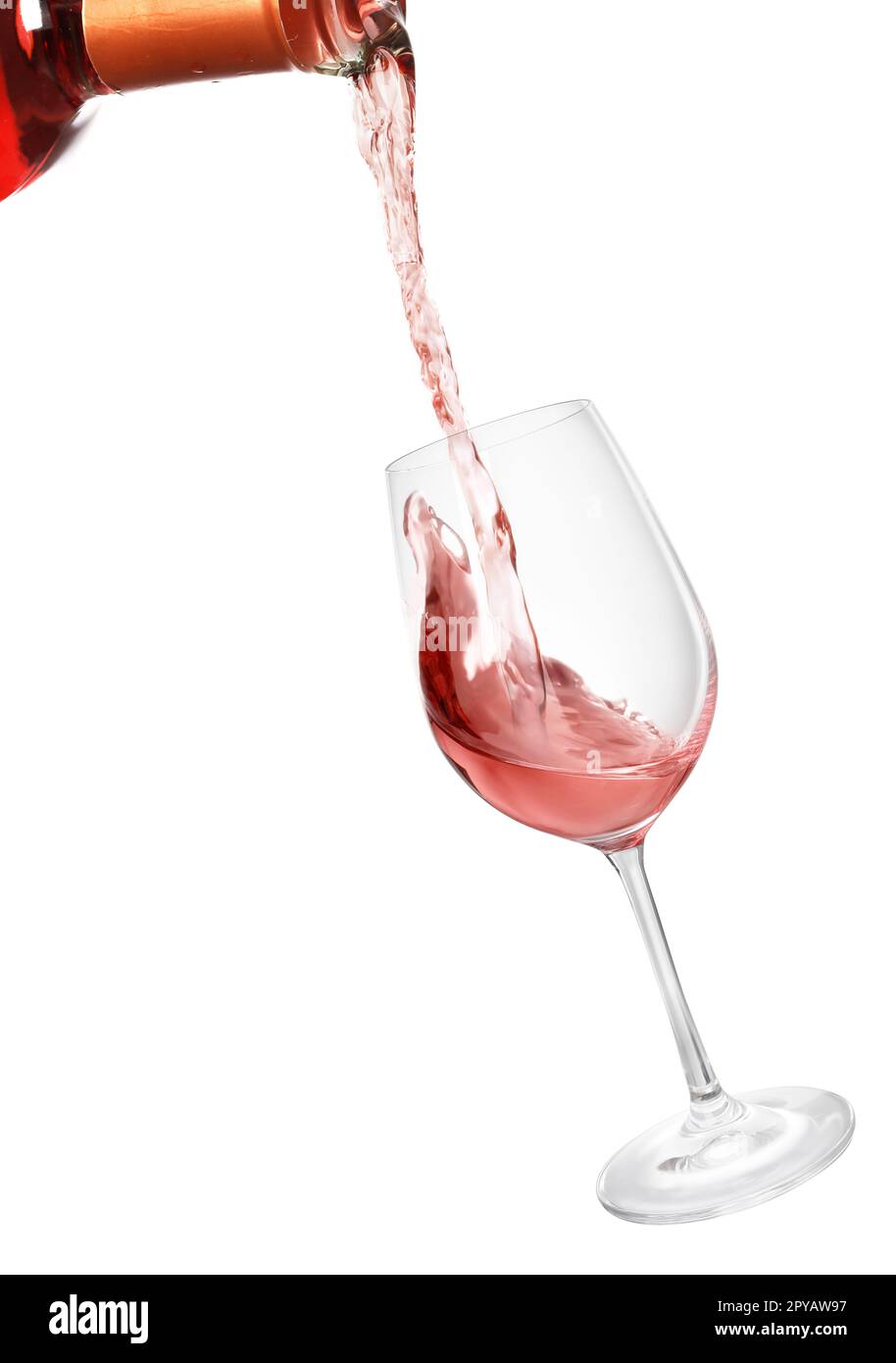 Pouring rose wine from bottle into glass on white background Stock ...