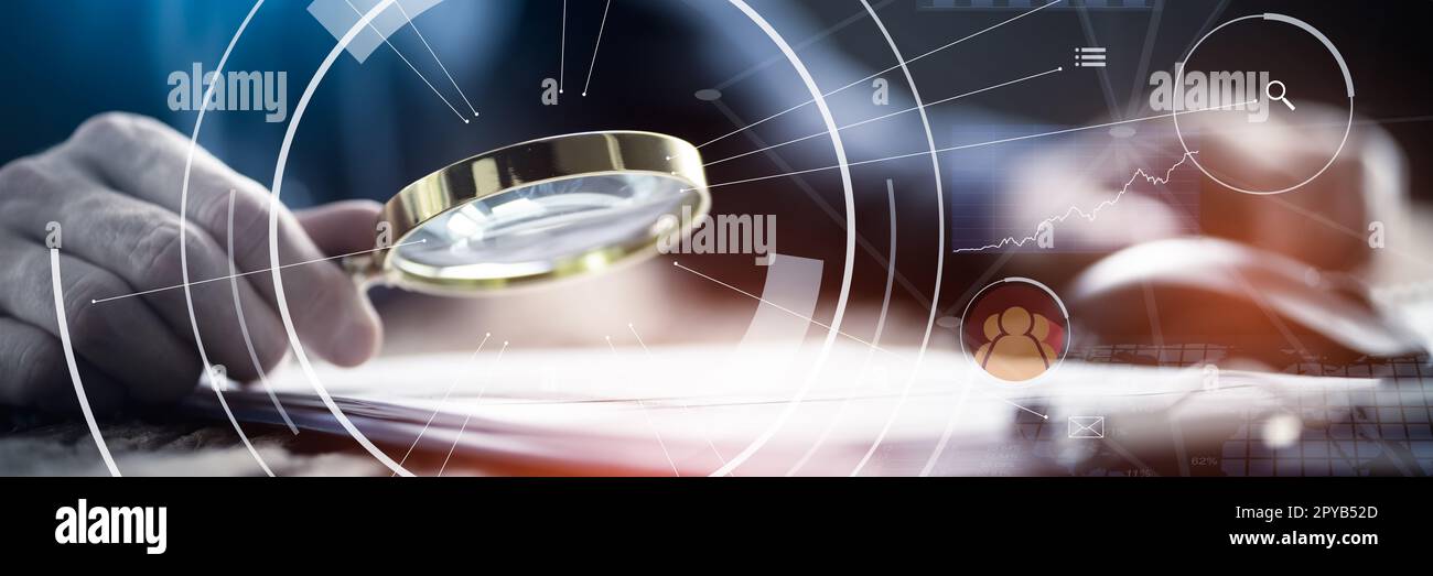 Business Auditor Using Magnifying Glass Stock Photo