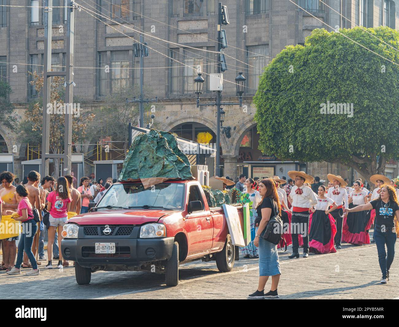 Mexico, APR 22 2023 - People dress up in traditional clothes parade in the street Stock Photo