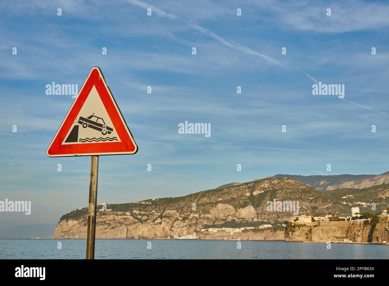 International road sign 'Unprotected quayside or riverbank'. It's ...