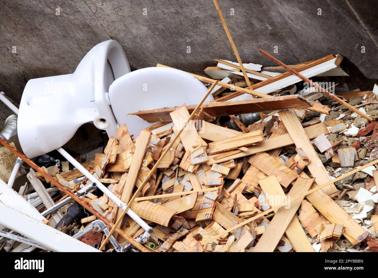 Container filled with trash from household reconstruction Stock Photo ...